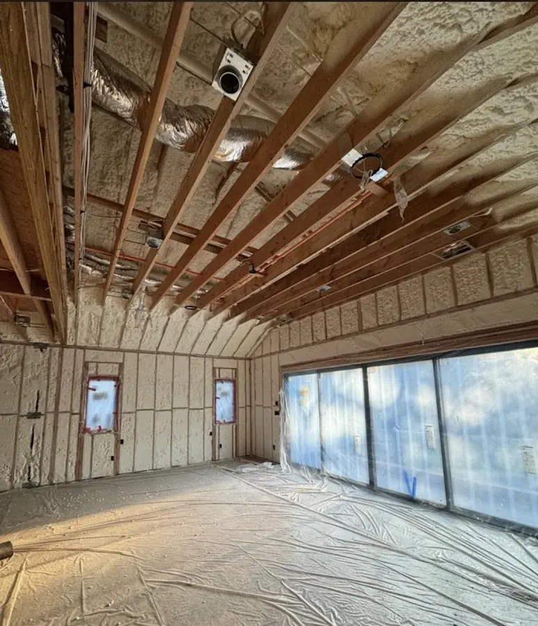 Interior walls and ceiling insulated with spray foam during new construction in Sellersburg